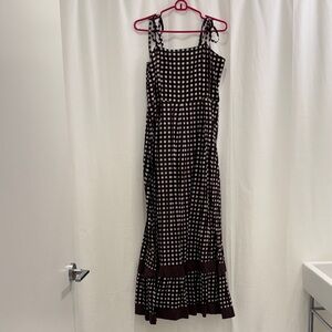 Madison Matthew’s Elegant Brown and White Checkered Dress